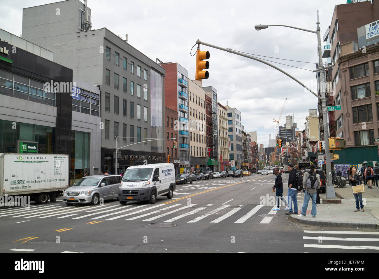 looking east along canal street at junction with bowery New York City USA Stock Photo