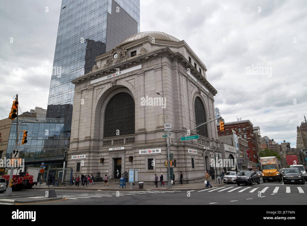 50 and 58 bowery citizens savings bank at junction of bowery and canal street New York City USA Stock Photo