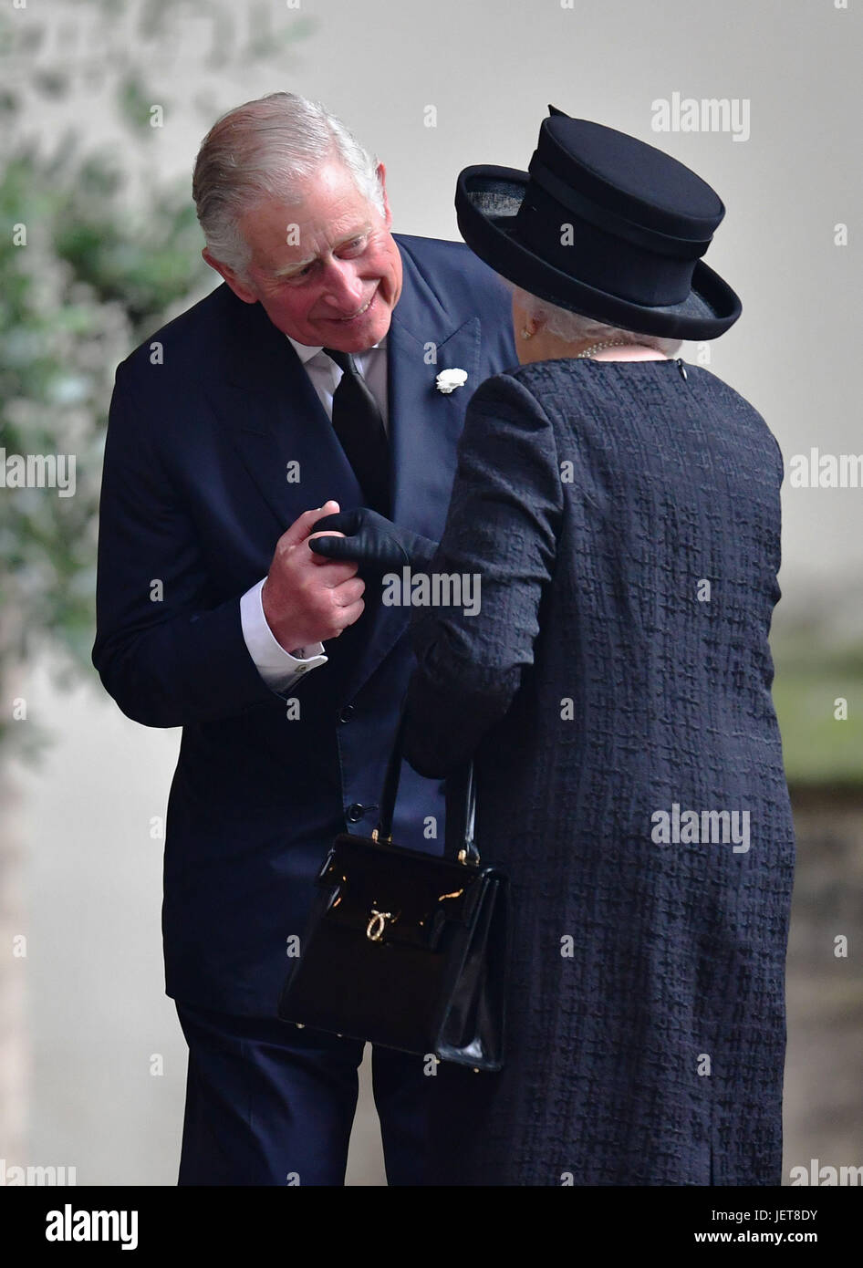 The Prince of Wales greets Queen Elizabeth II at the funeral of Countess Mountbatten of Burma at St Paul's Church, Knightsbridge, London. Stock Photo