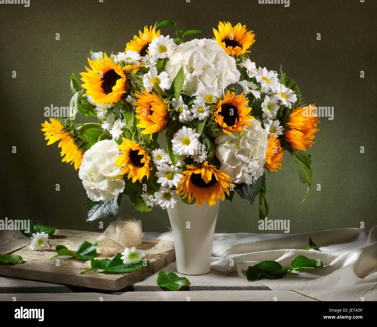 Bouquet of flowers with sunflowers and hydrangeas. Stock Photo