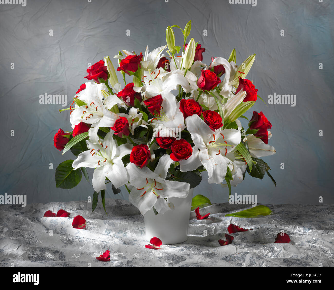 Bouquet of flowers with roses and lily. Stock Photo
