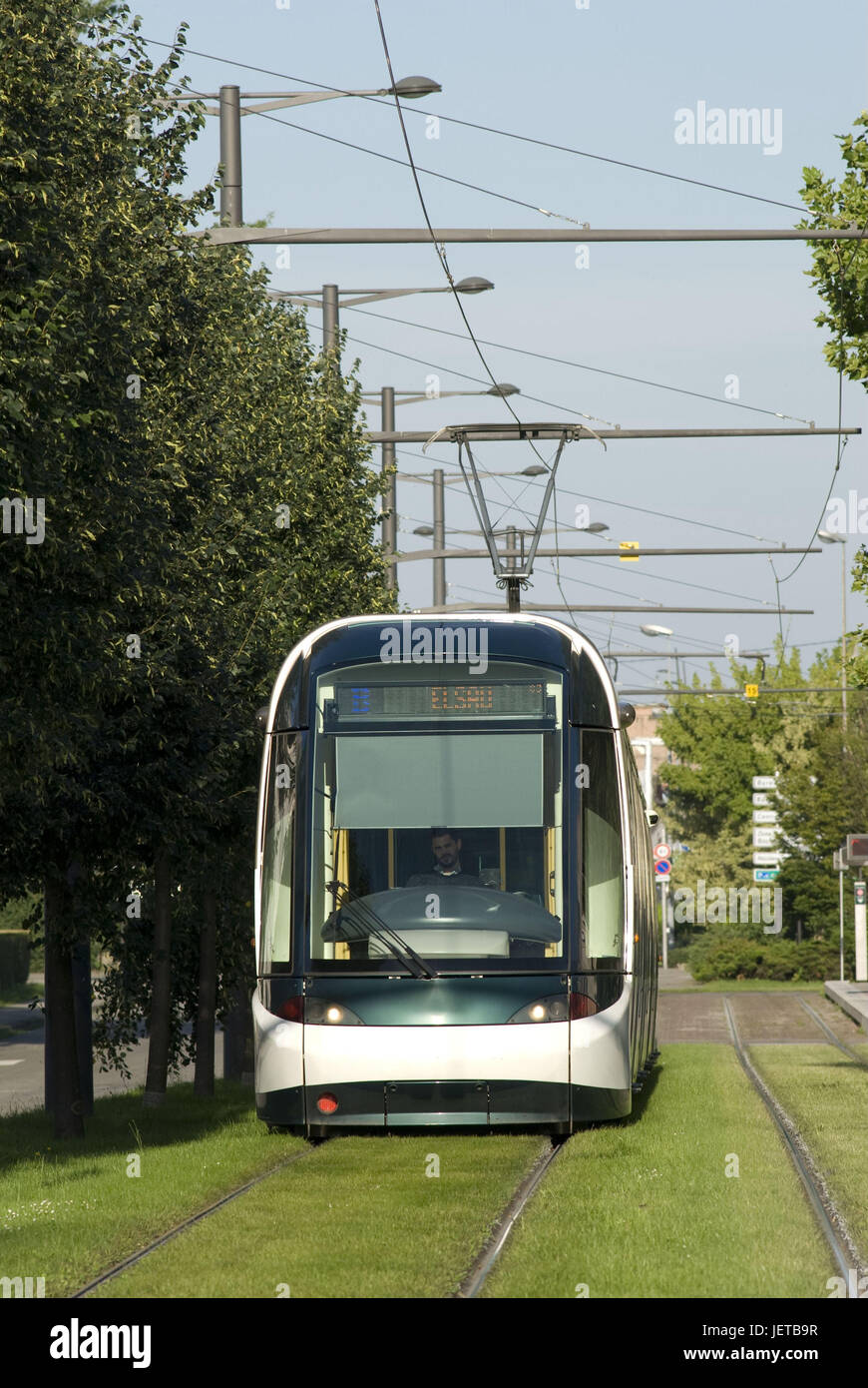 France, Alsace, home Schiltig, tram, Europe, destination, town, means of transportation, publicly, trajectory, rail transport, short-distance traffic, outside, meadow, green areas, drivers, tram drivers, sun visor, person, luminous display, Stock Photo