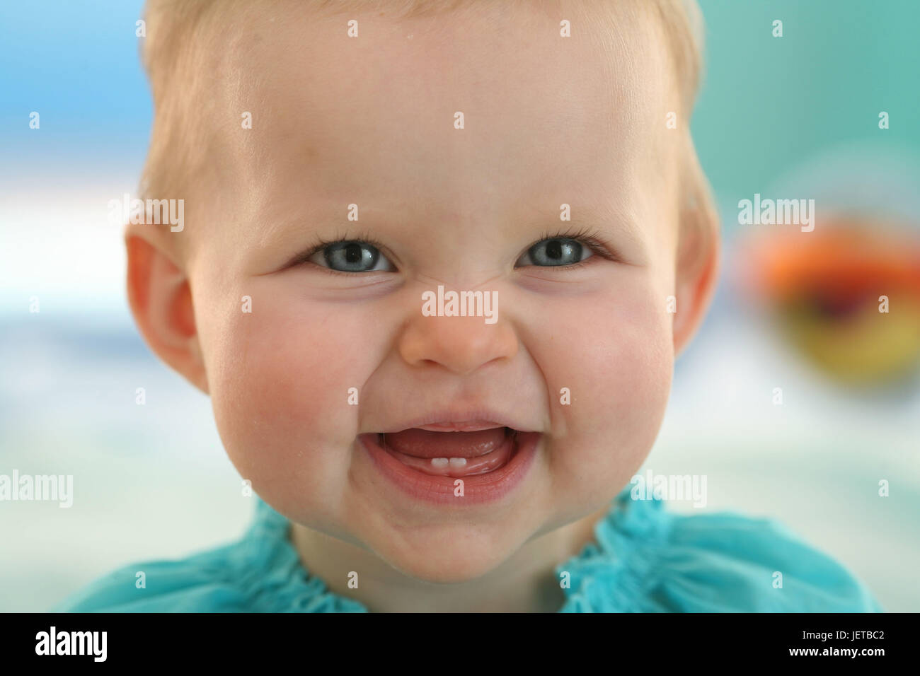 Baby, 6 months, laugh, medium close-up, Stock Photo