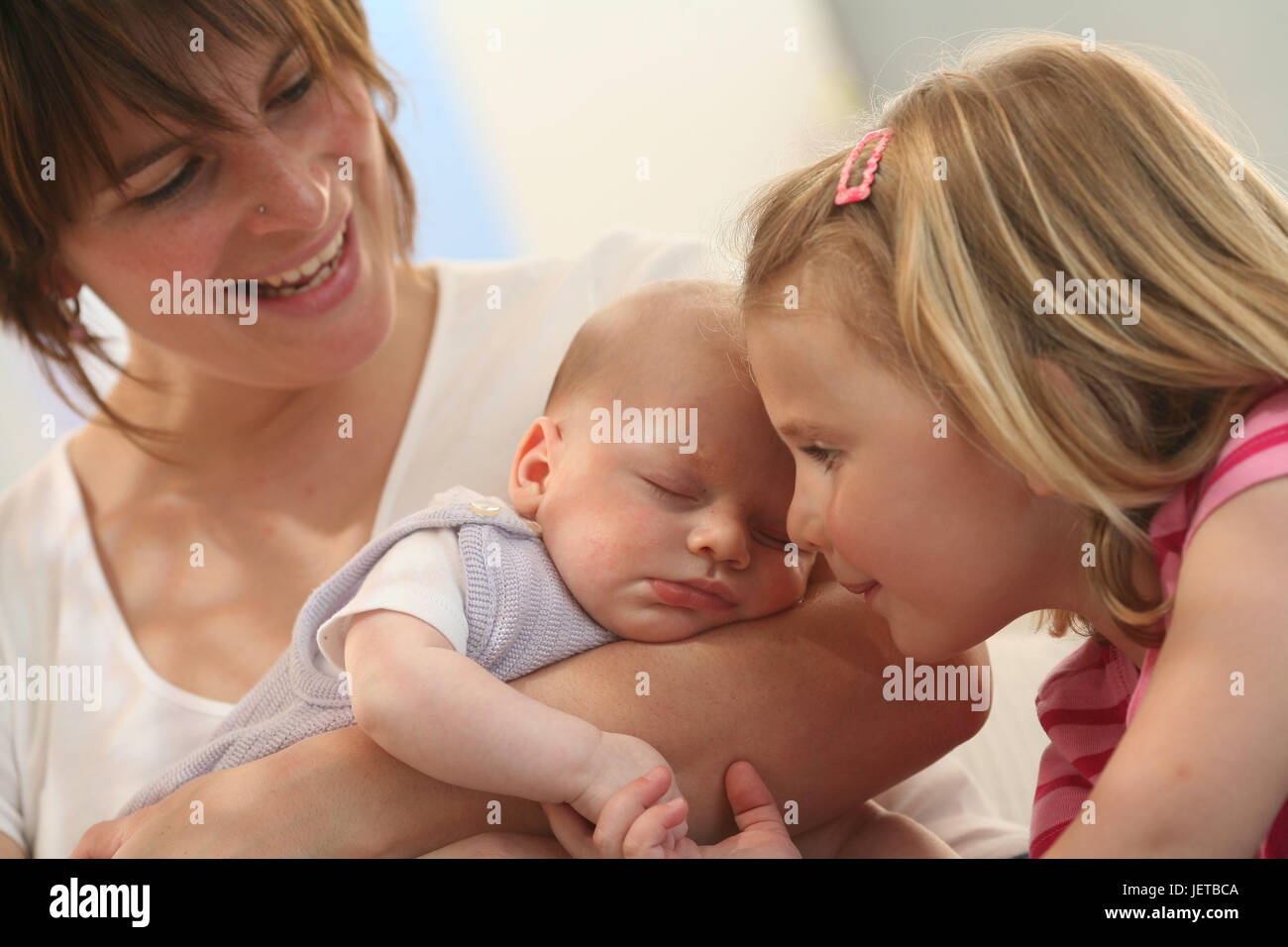 Family, mother, baby, 3 months, infant, 3 years, touch, sibling love, Stock Photo