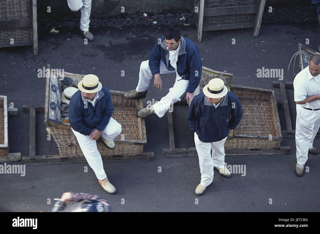 Portugal, island Madeira, Funchal, Monte, wicker slide, men, wait, from above, island capital, roadside, locals, Carreiros, 'slide guides', means of transportation, tourist attraction, attraction, destination, tourism, Stock Photo