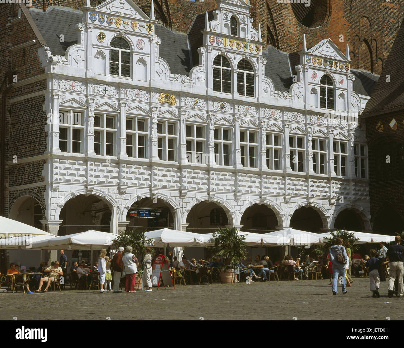 Germany, Schleswig - Holstein, Lübeck, Old Town, city hall, Renaissance bower, restaurant, 'rathskeller', passer-by, North Germany, Hanseatic town, Old Town island, building, house, house facade, structure, architecture, historically, show wall, city hall building, to Renaissance foliage, Renaissance wing, coat of arms, historically, architecture, person, guests, gastronomy, place of interest, UNESCO-world cultural heritage, outside, Stock Photo