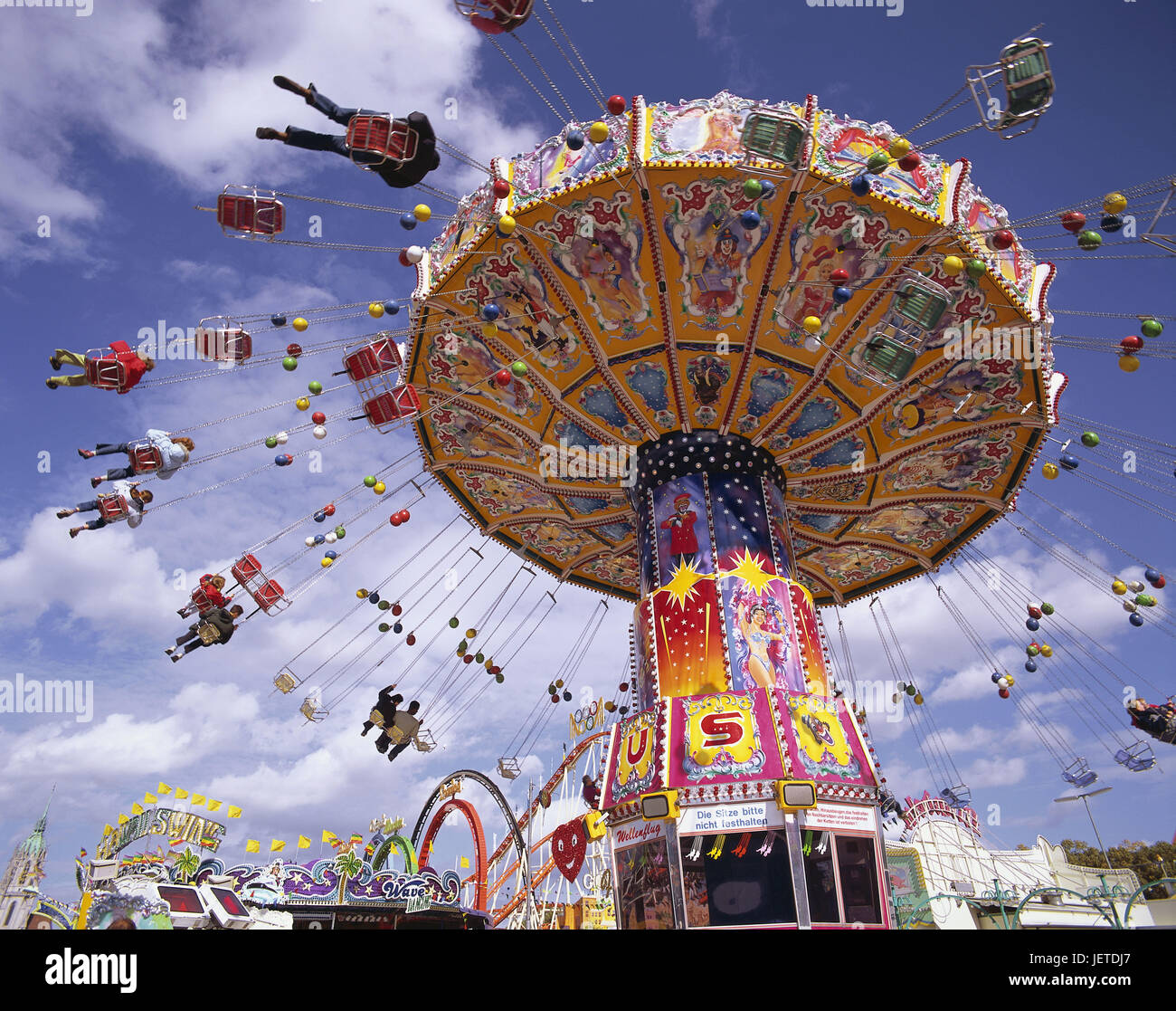 Germany, Bavaria, Munich, October feast, catena carousel, no model release, town, Theresienwiese, Wiesn, feast, public festival, pleasure feast, fairground, driving business, carousel, motion, meadow visitor, person, tourism, attraction, amusement, sky, blue, clouds, sunshine, Stock Photo