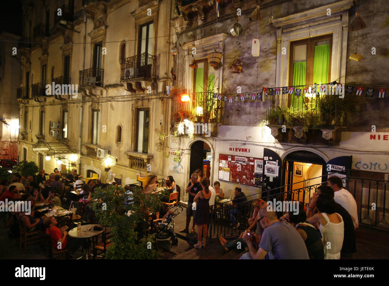 Italy, Sicily, Catania, Old Town, street cafe, tourist, evening, Southern Europe, island, town, houses, buildings, house facades, bar, cafe, restaurant, person, guests, destination, tourism, gastronomy, Stock Photo