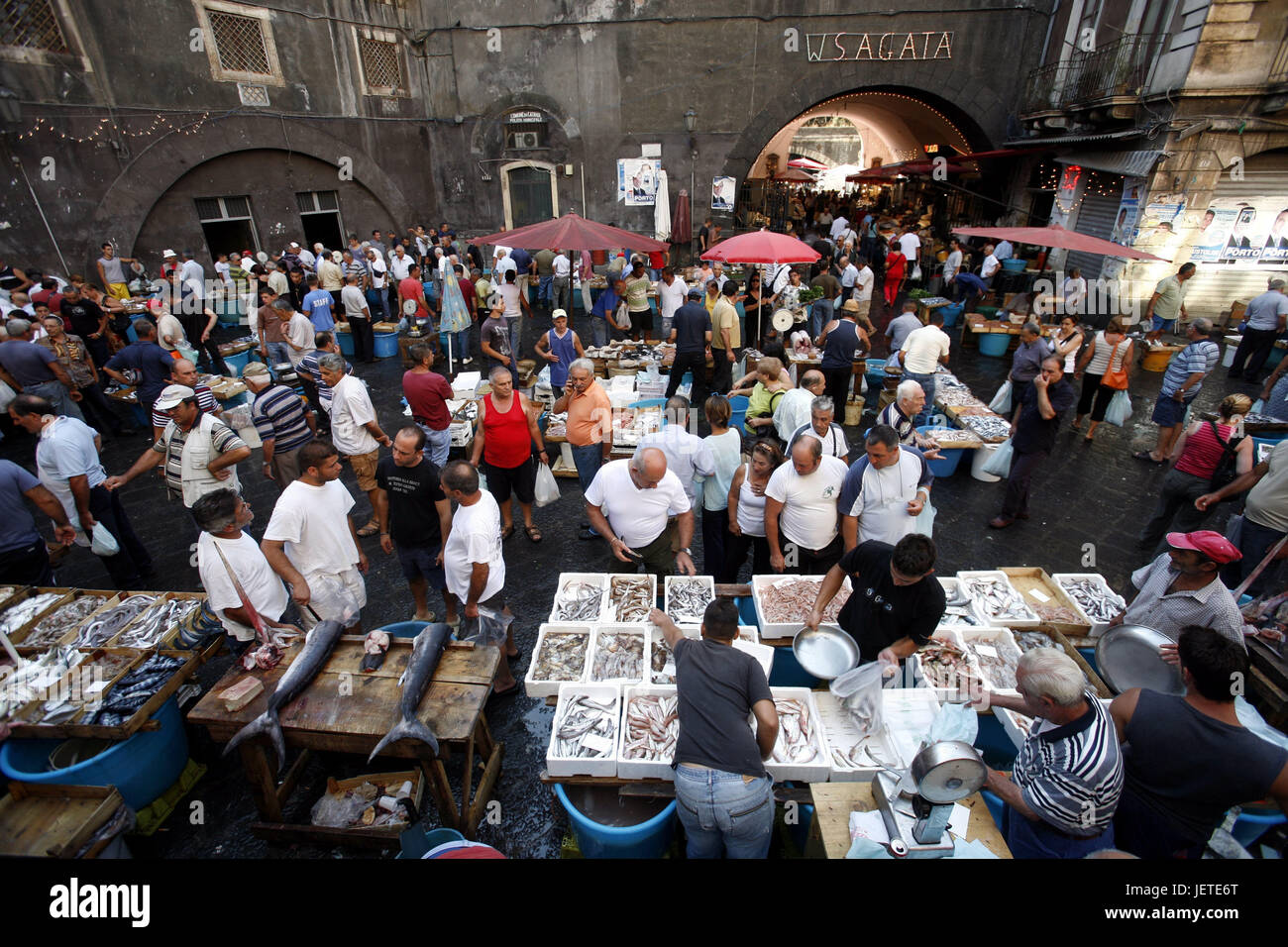 Italy, Sicily, Catania, Old Town, fish market, Southern Europe, lane, weekly market, market, market stalls, sales, fish, food fish, food, dealers, customers, people, crowd of people, economy, retail trade, destination, tourism, Stock Photo