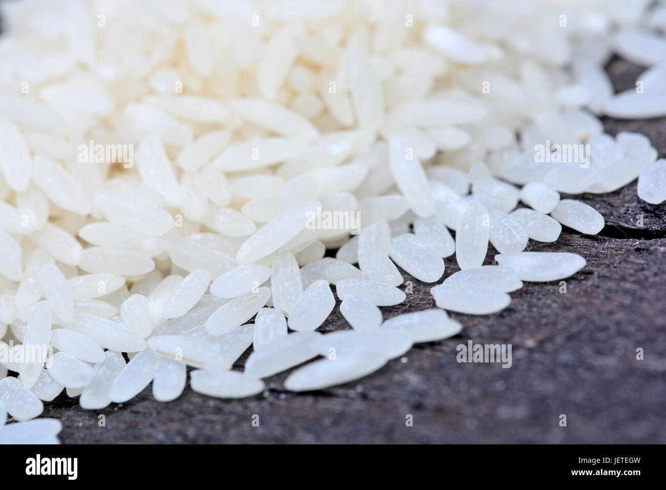 White Items Rice White rice on wooden hi-res stock photography and images - Alamy