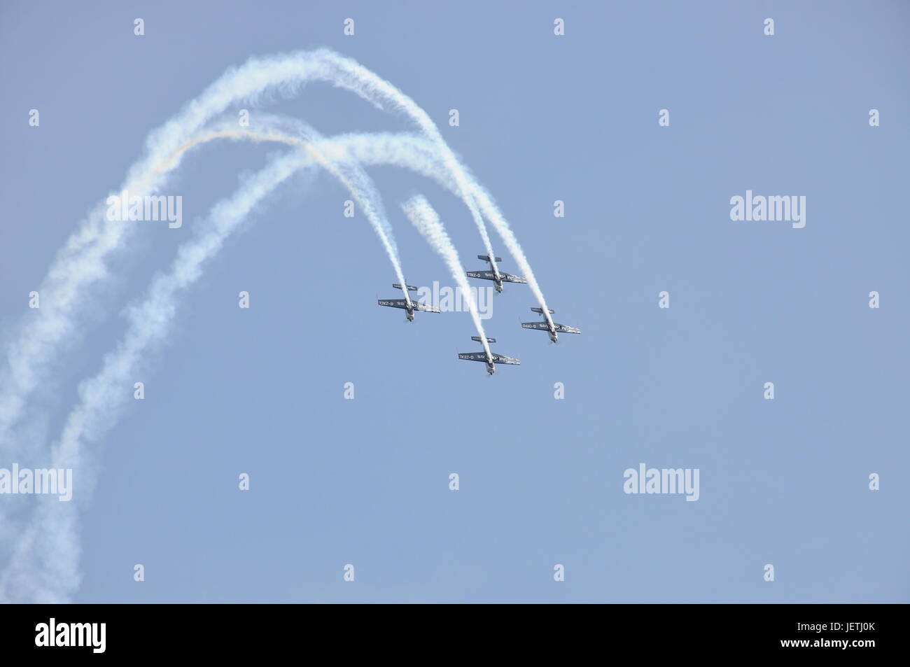 Four Airplanes Formation Acrobatics Stock Photo