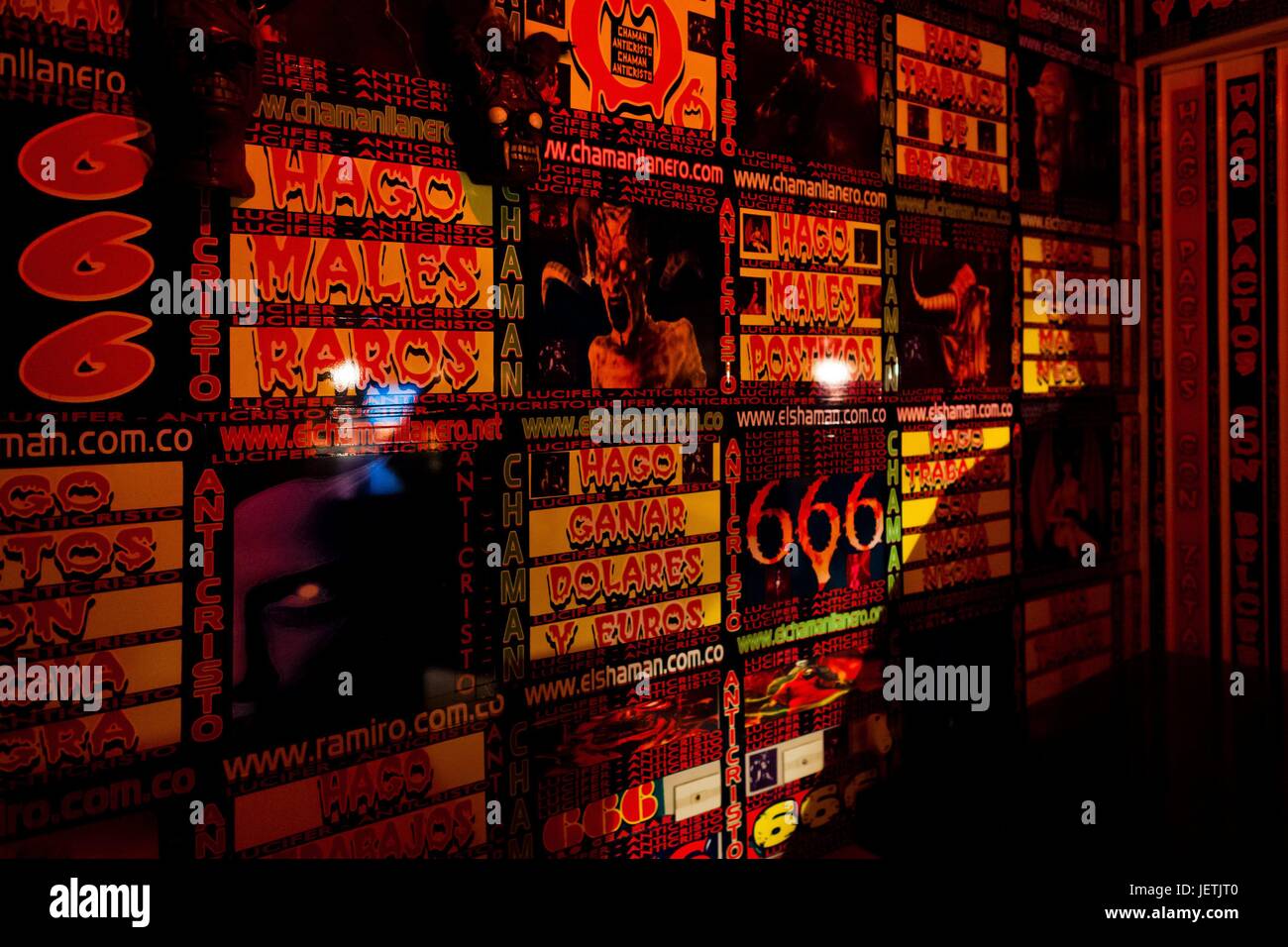 Walls covered by Satanistic symbols and visual signs seen in the office of Ramiro Lopez, a Colombian ‚Äòbrujo‚Äô calling himself Shaman Llanero, in Bogota, Colombia, 29 June 2013. During the last decade, the religious globalization of the urban are | usage worldwide Stock Photo