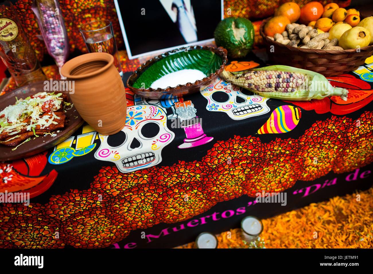 Food offerings are placed at the altar of the dead (altar de muertos ...