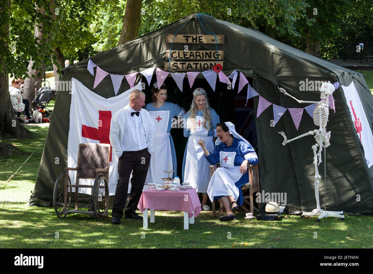 Medical Staff Dressed in 1940's Uniforms Sharing a Funny Moment During the  Barnard Castle 1940's Weekend Celebrations, County Durham, UK. Stock Photo