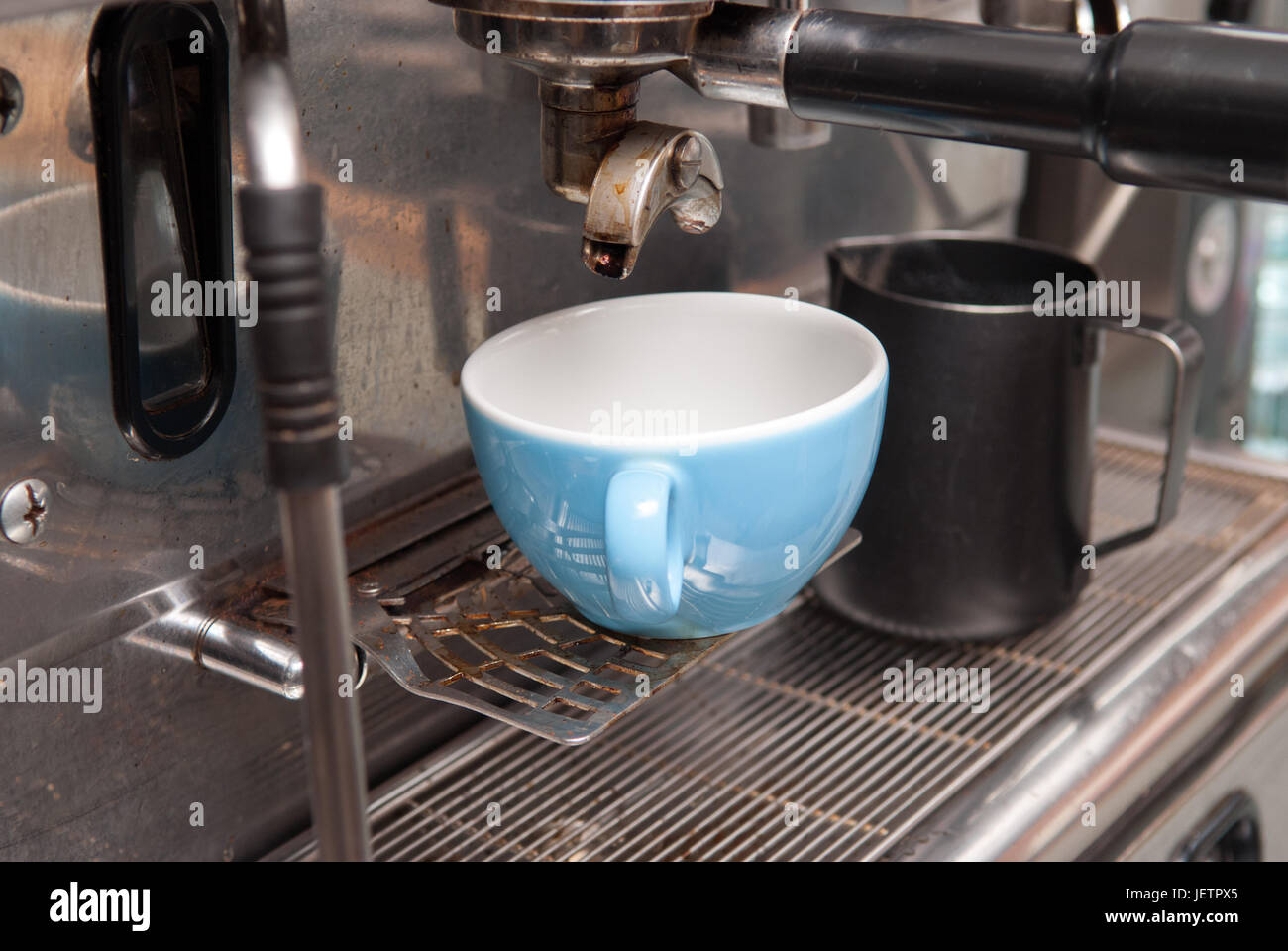 commercial coffee making machine in a cafe ready to pour coffee Stock Photo Alamy