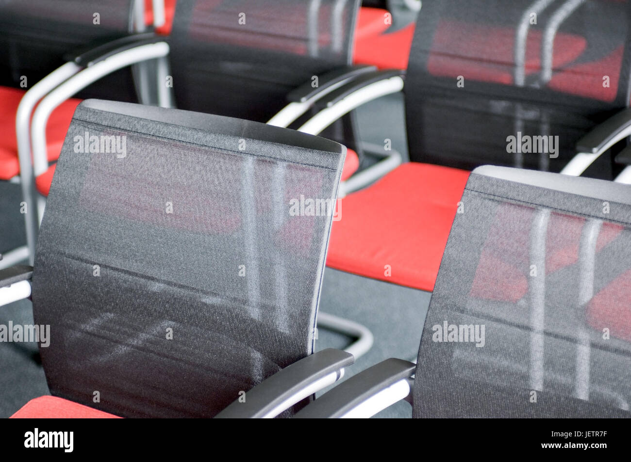 Chair rows in a conference space, Stuhlreihen in einem Konferenzraum Stock Photo