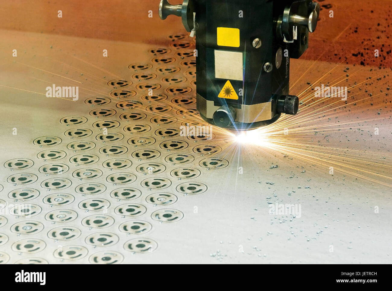 Laser guts device with the form reaping from a steel tin record, Laserschneidegeraet beim Formenschneiden aus einer Stahlblechplatte Stock Photo