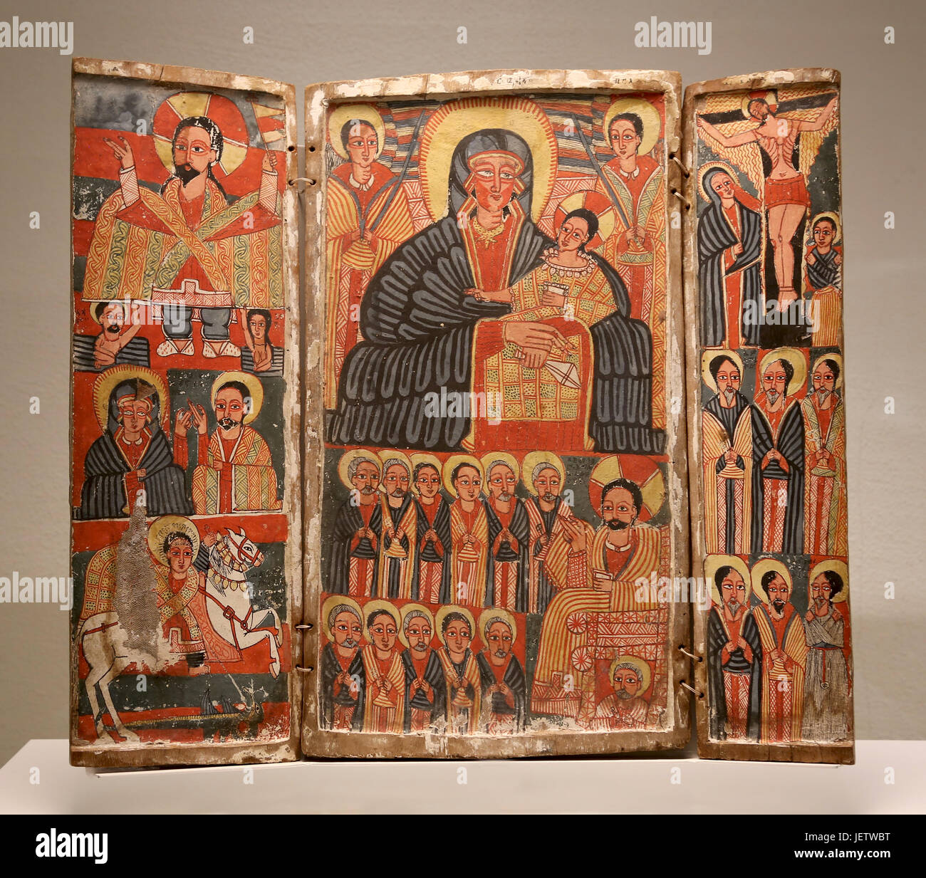 Triptych with Mary, scenes of the life of Jesus and Saints. Ethiopian Christian art. End of 17th Century. Paint on wood. First Gondarene Period. Stock Photo