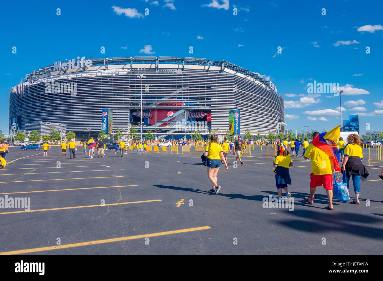 NEW YORK, USA - NOVEMBER 22, 2016: Unidentified ecuadorian fans walking to enter to Metlife Stadium to see the football game in New York Usa. Stock Photo