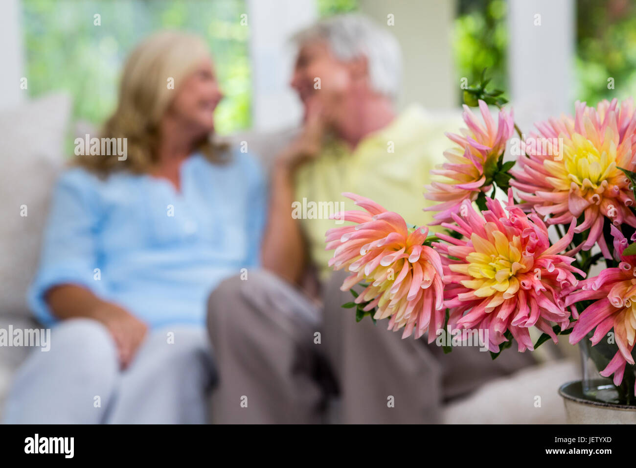 Romantic senior couple sitting at home Stock Photo - Alamy