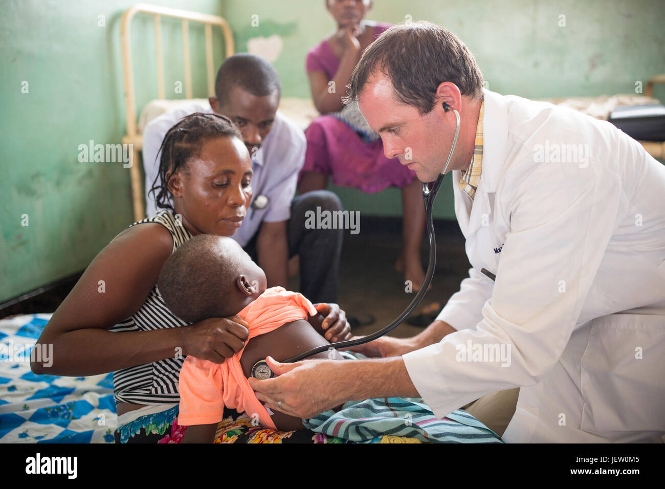 An expat missionary doctor works on the pediatric ward at Bundibugyo Hospital, Uganda. Stock Photo