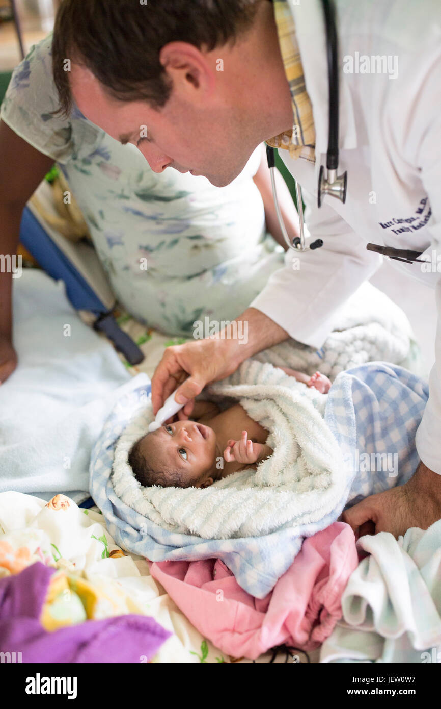 An expat missionary doctor works on the pediatric ward at Bundibugyo Hospital, Uganda. Stock Photo