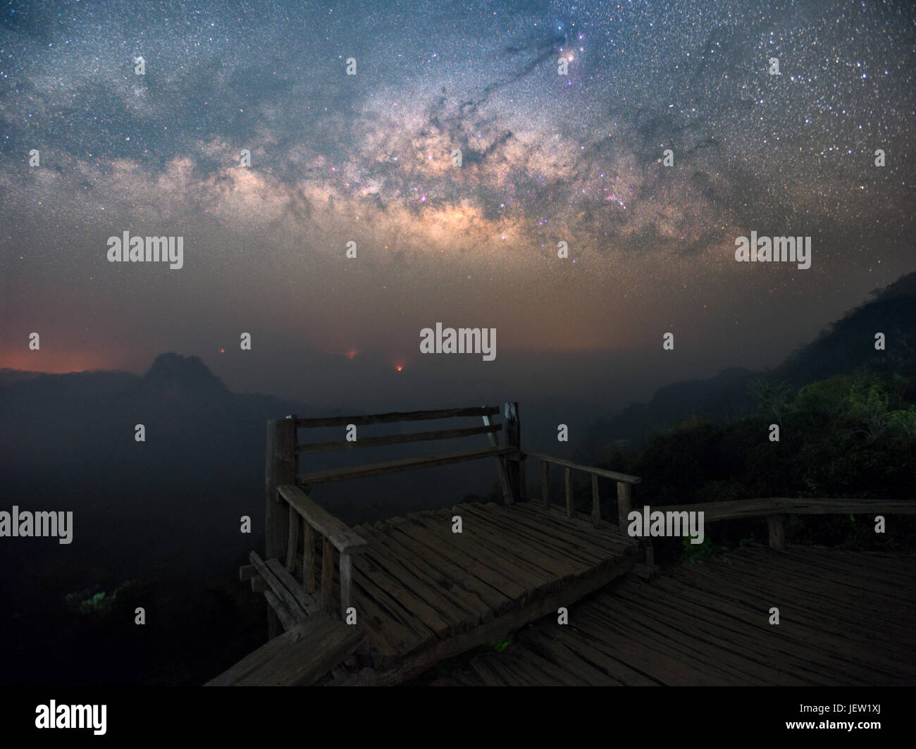 Beautiful Night Starry sky with Rising Milky Way over the mountain, Thailand Stock Photo