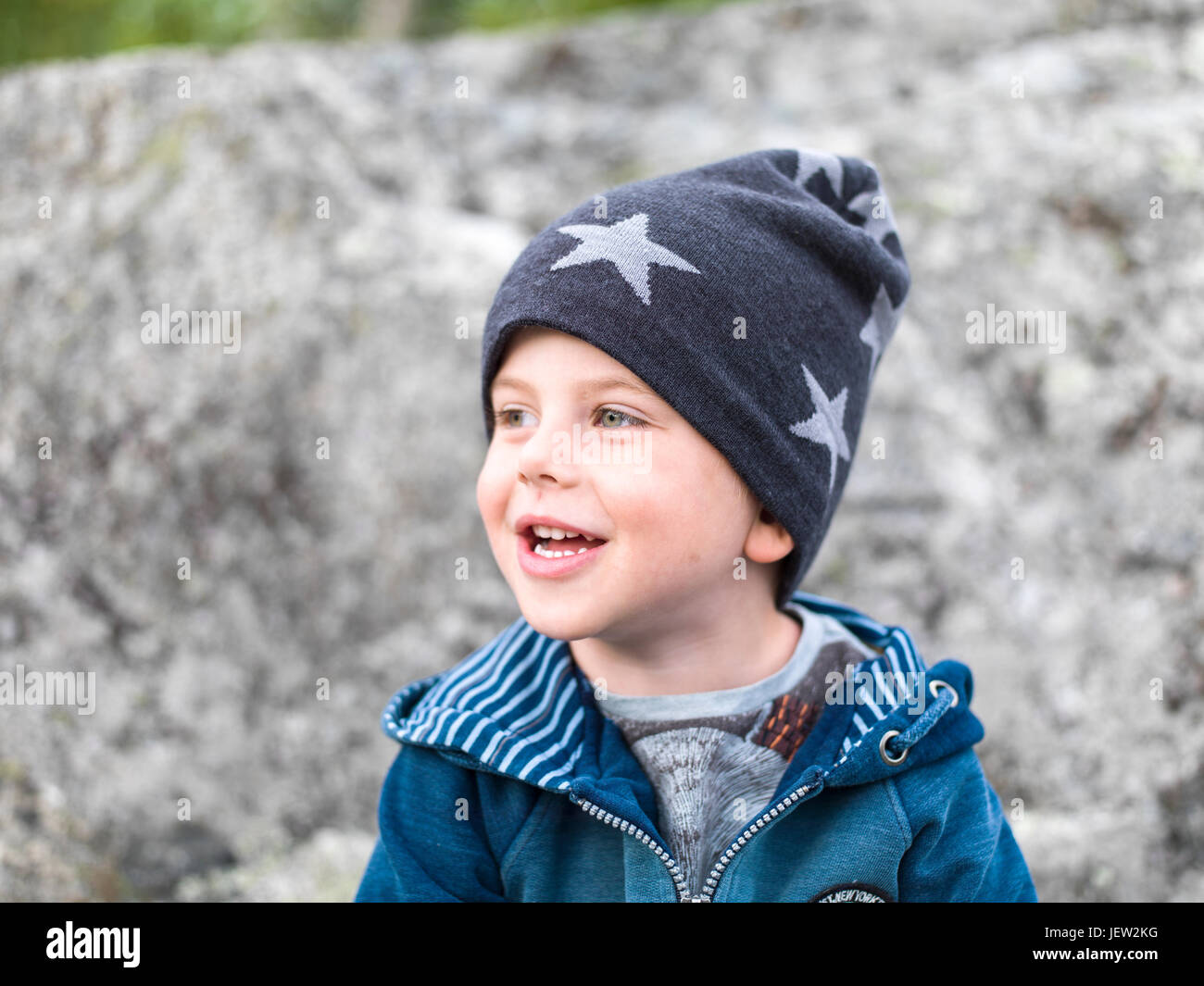 Smiling boy wearing hat Stock Photo Alamy