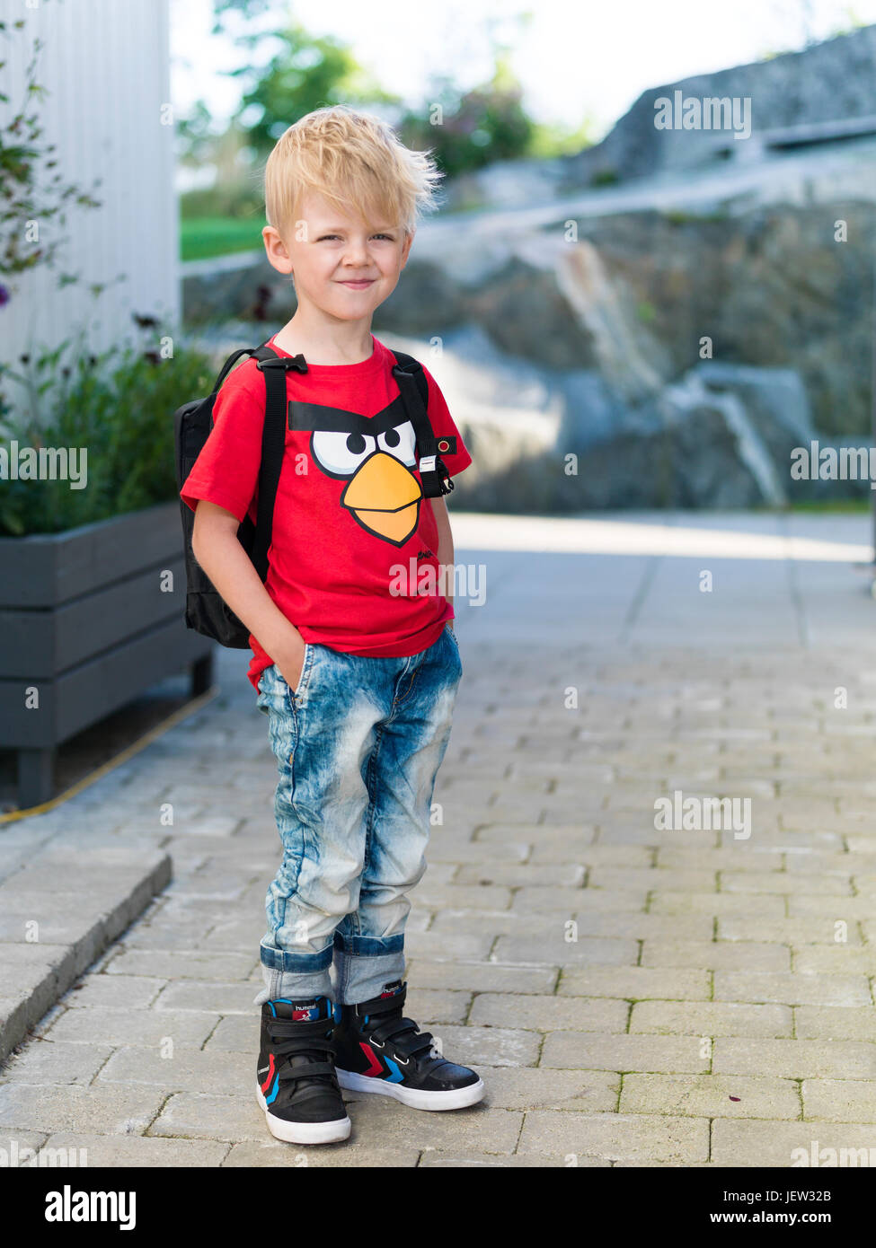 Smiling boy looking at camera Stock Photo - Alamy