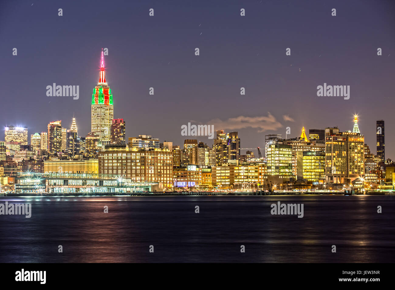 Empire State Building in New York with Skyline at Night Stock Photo