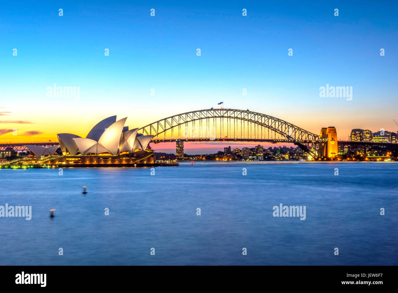 View on Sydney Opera house and harbour bridge at sunset Stock Photo - Alamy