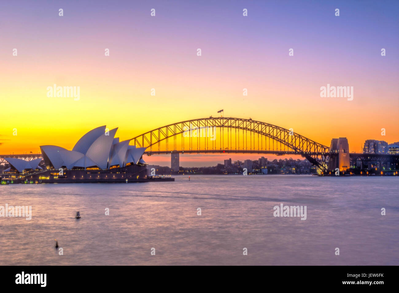 View on Sydney Opera house and harbour bridge at sunset Stock Photo - Alamy