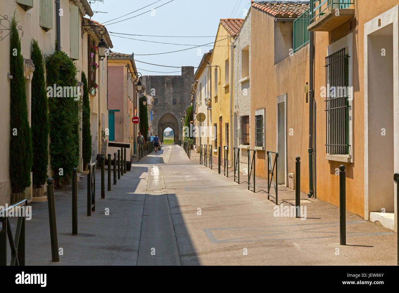 Picturesque old street in Aigues Mortes, France. Stock Photo