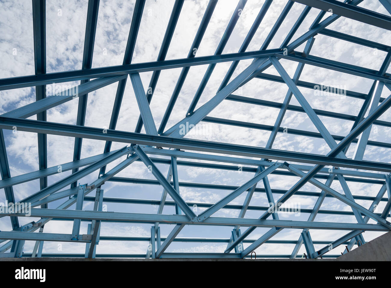 Structure of steel roof frame for building construction on sky ...