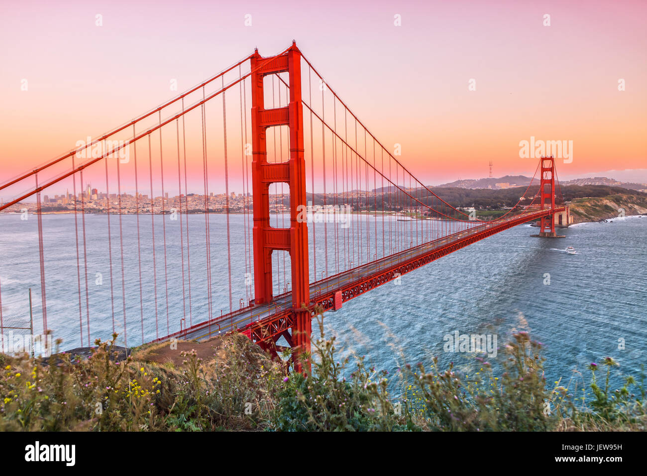 Golden Gate Bridge in San Francisco while the Sun is going down Stock Photo