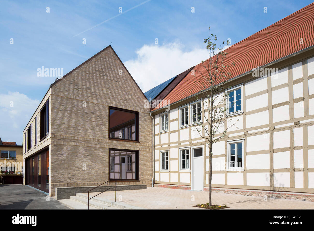 Facade juxtaposition. Kindergarten Mitte Kyritz, Kyritz, Germany. Architect: kleyer koblitz letzel freivogel, 2016. Stock Photo