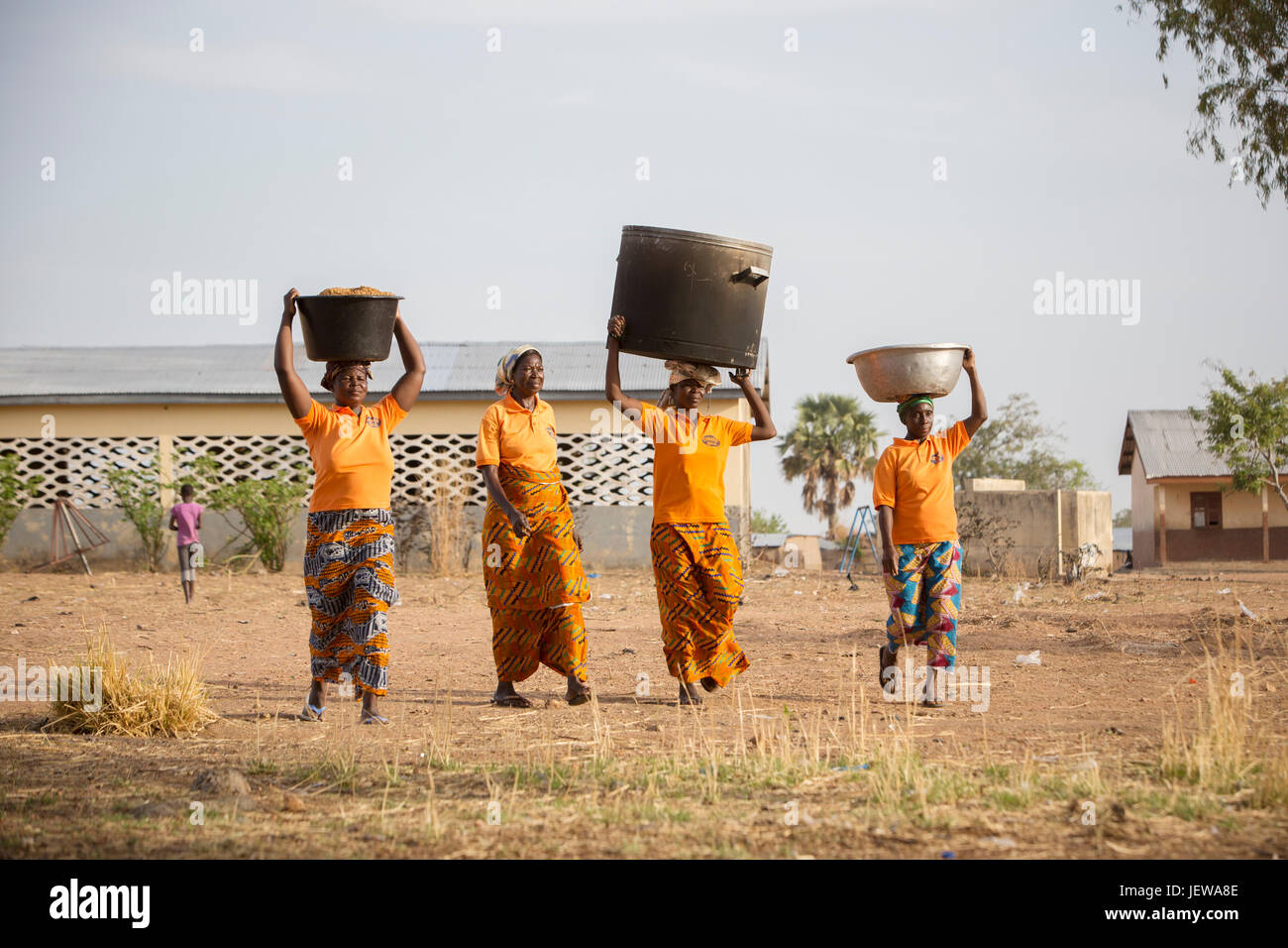 A women’s cooperative processes and parboils rice as an activity in UpperEast