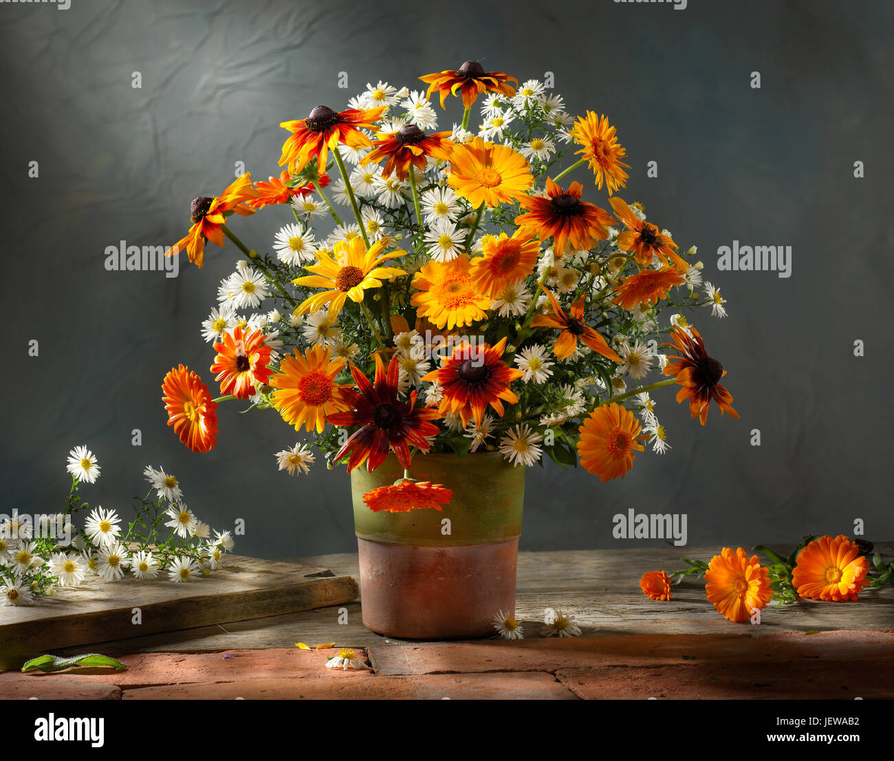 Bouquet of flowers with sunflower and daisies. Stock Photo