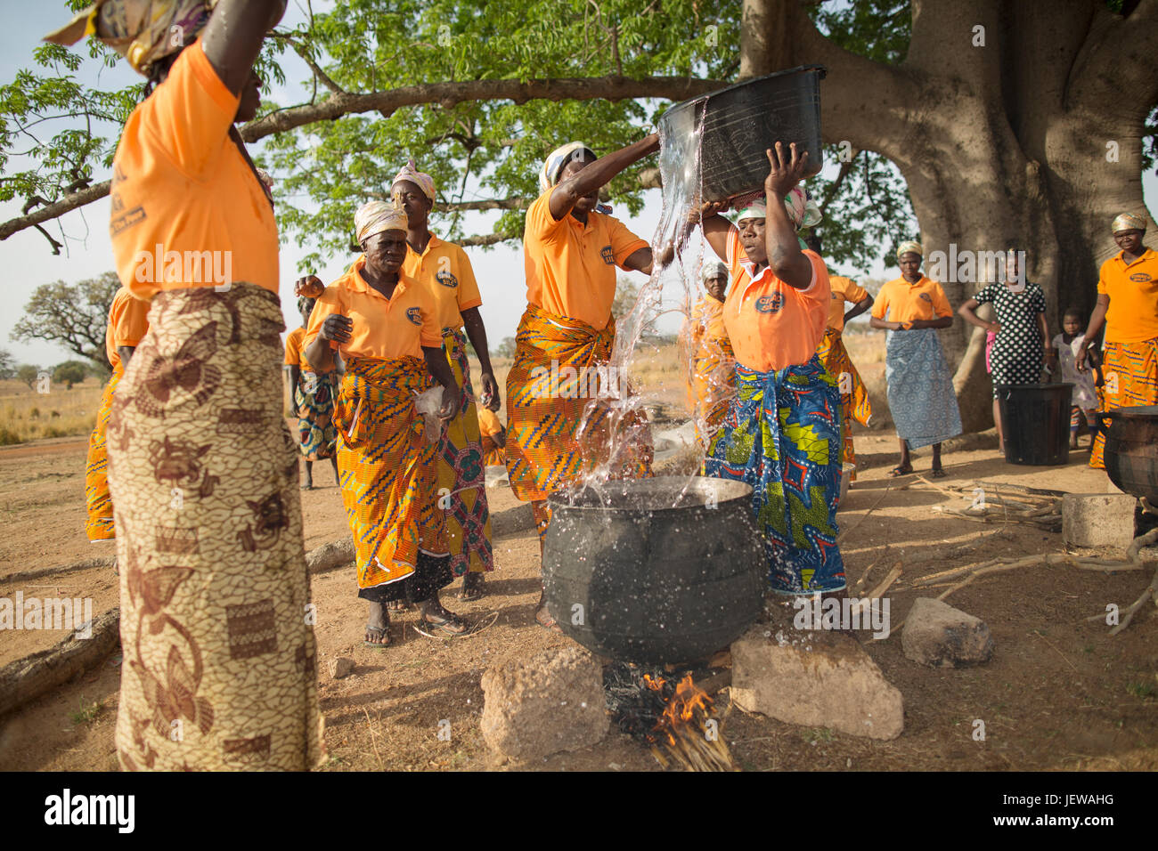 A women’s cooperative processes and parboils rice as an activity in UpperEast