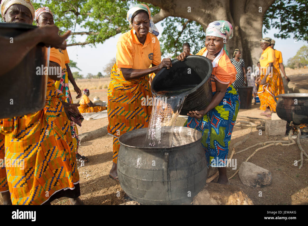 A women’s cooperative processes and parboils rice as an activity in UpperEast