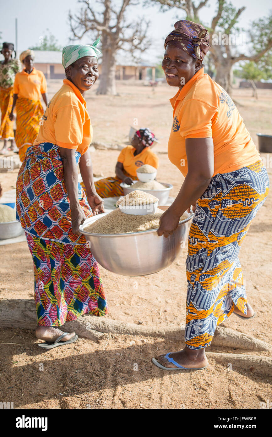 A women’s cooperative processes and parboils rice as an activity in UpperEast