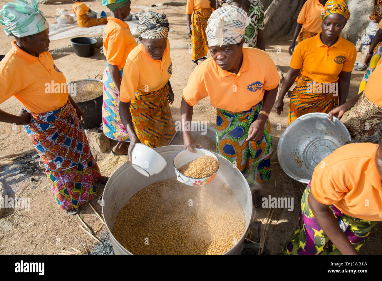 A women’s cooperative processes and parboils rice as an activity in UpperEast