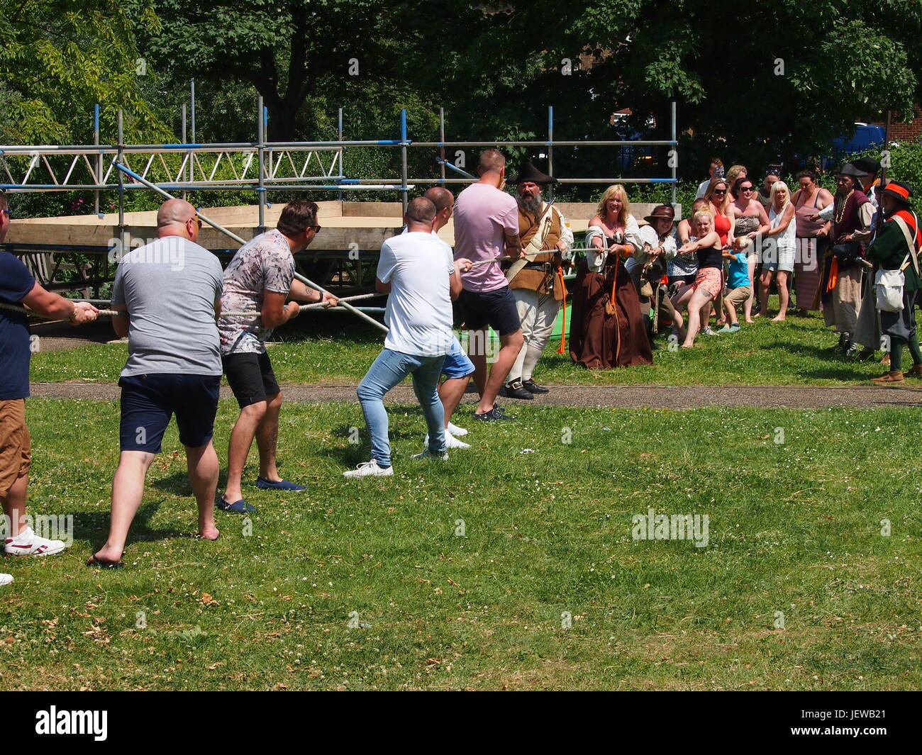 Adult tug of war competition in a public park Stock Photo Alamy