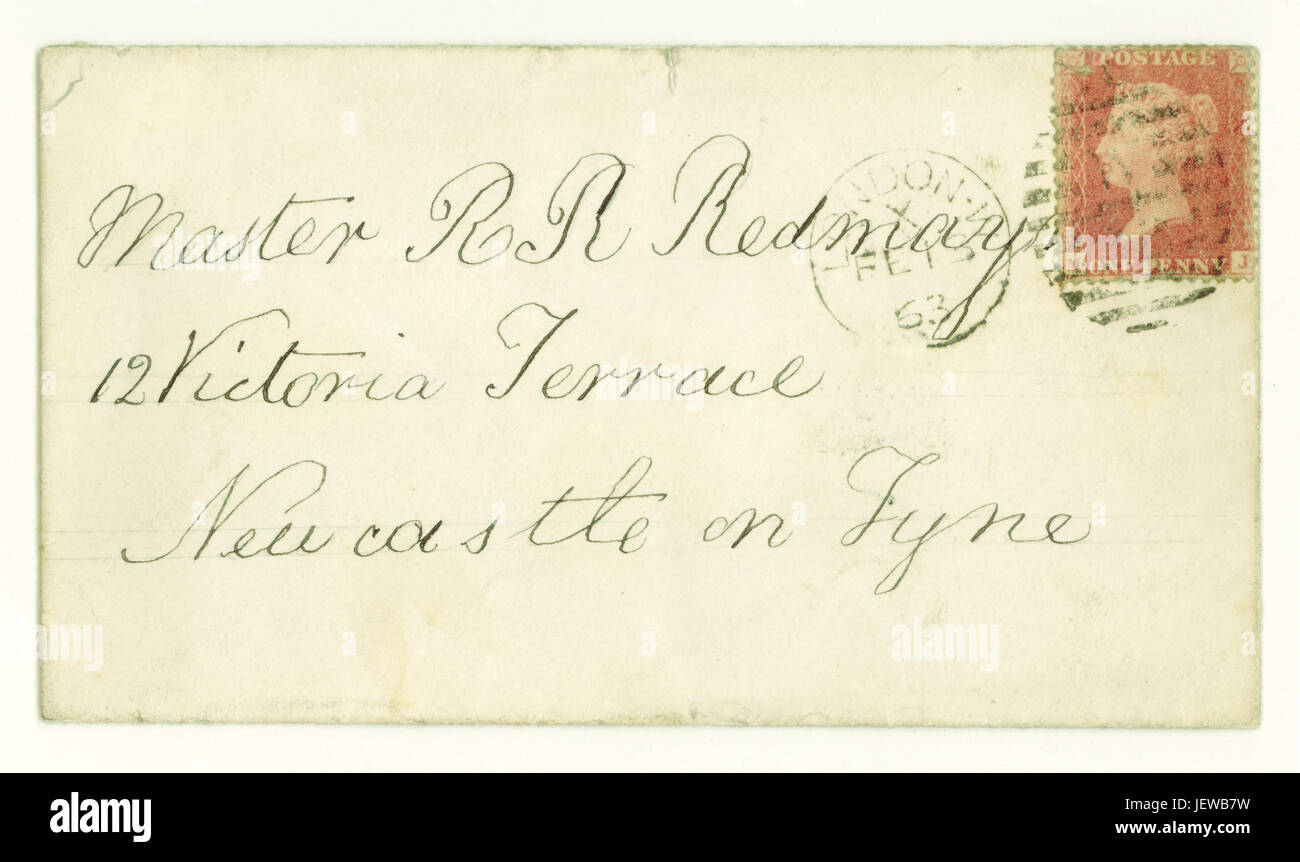 Original Victorian envelope for letter posted  from London to Newcastle on Tyne, postmarked February 1863, with a penny red stamp depicting Queen Victoria,  U.K. Stock Photo