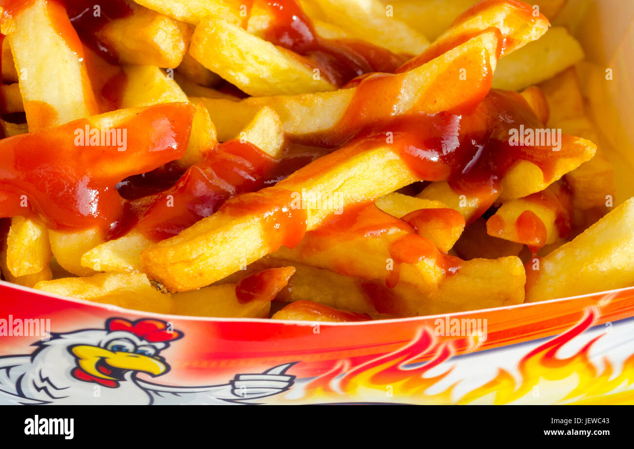 Portion of Take Away Chips with Tomato Sauce Stock Photo Alamy