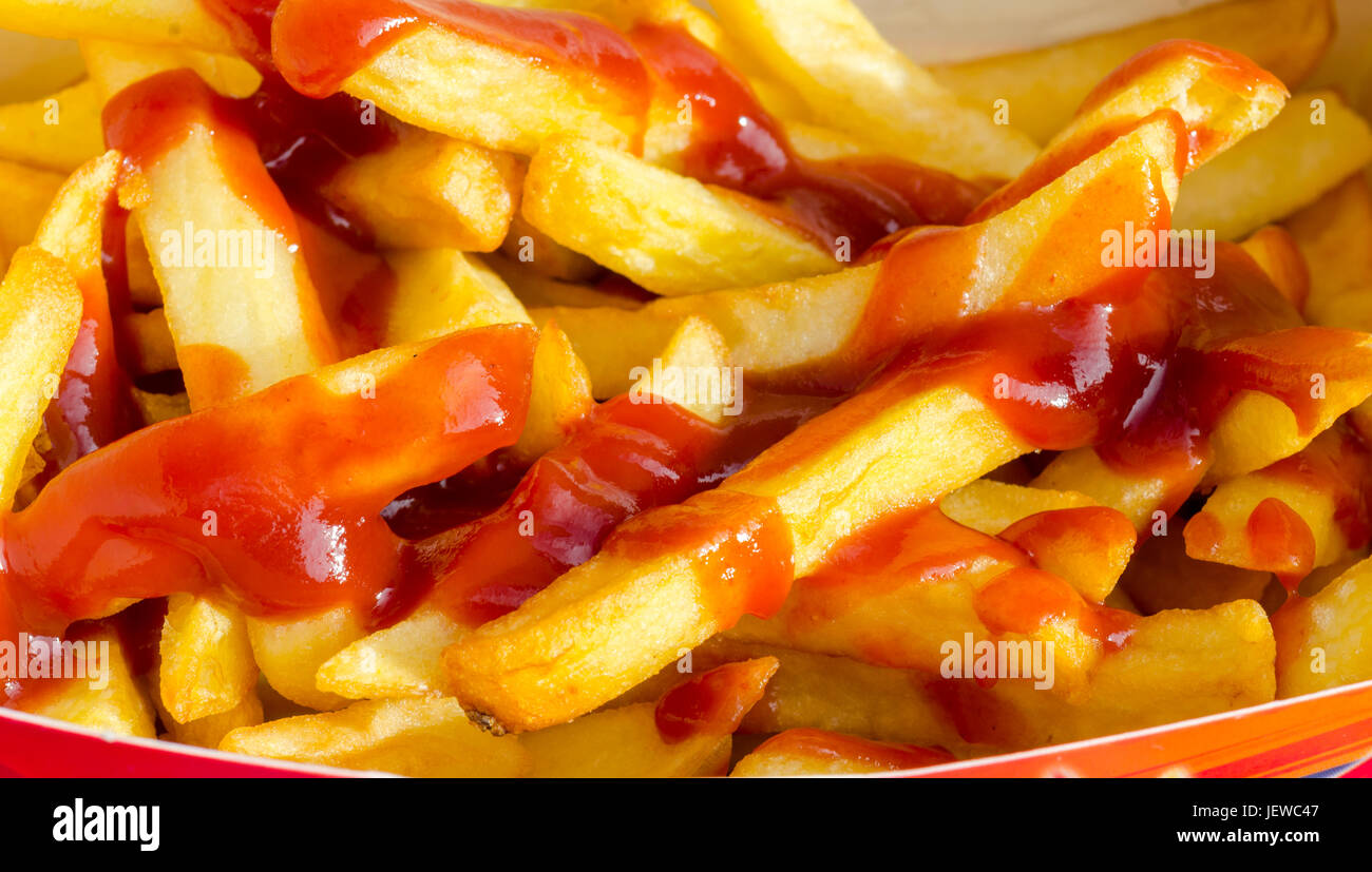 Portion of Take Away Chips with Tomato Sauce Stock Photo Alamy