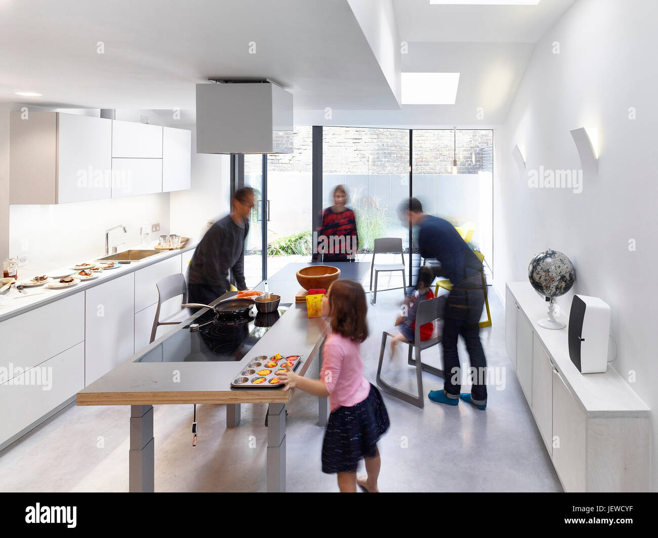 Kitchen un use, adjustable height work-top, joining the table to the