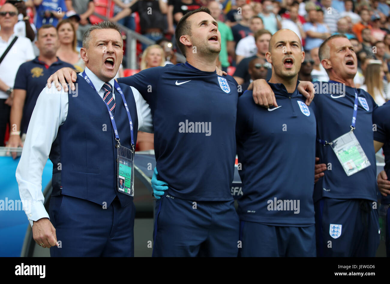 England manager Aidy Boothroyd sings the national anthem before the UEFA European Under-21 Championship, Semi Final match at Stadion Miejski, Tychy. Stock Photo