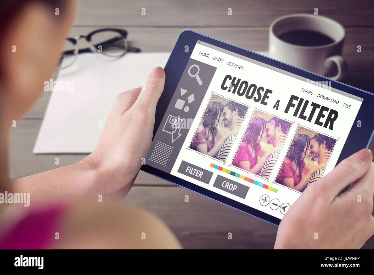 Photo Using Tablet Composite image of woman using tablet pc Stock Photo - Alamy