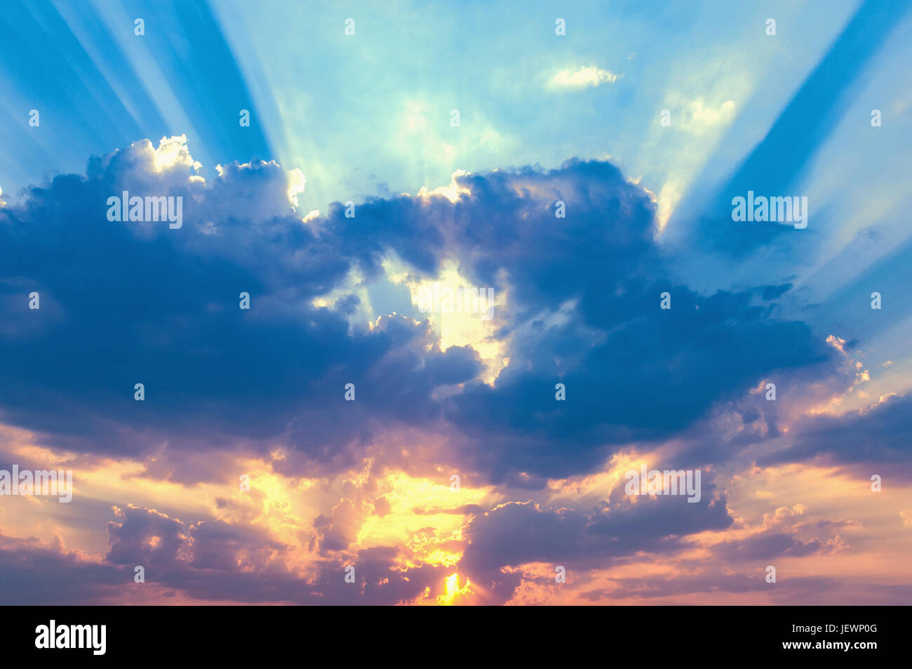 Amazing cloudscape on the sky at sunset time after rain Stock Photo - Alamy